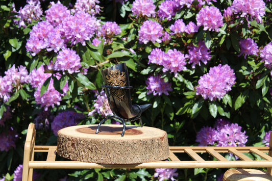 Drinking horns with handcrafted stand and unique design, polished natural horn for feasts and mead.