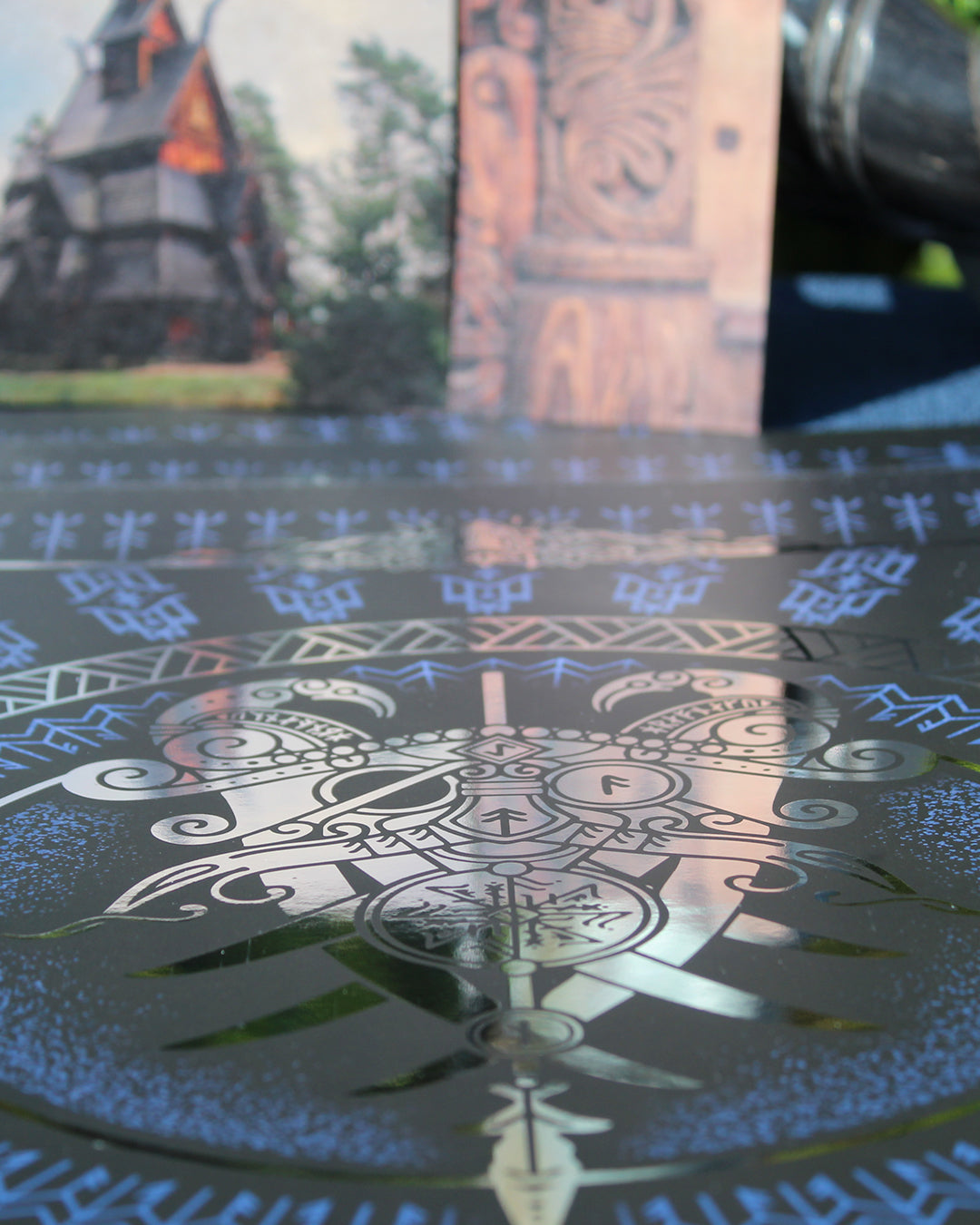 Silver foil A3 art print of Odin godmask inspired by Norse mythology and Viking art.