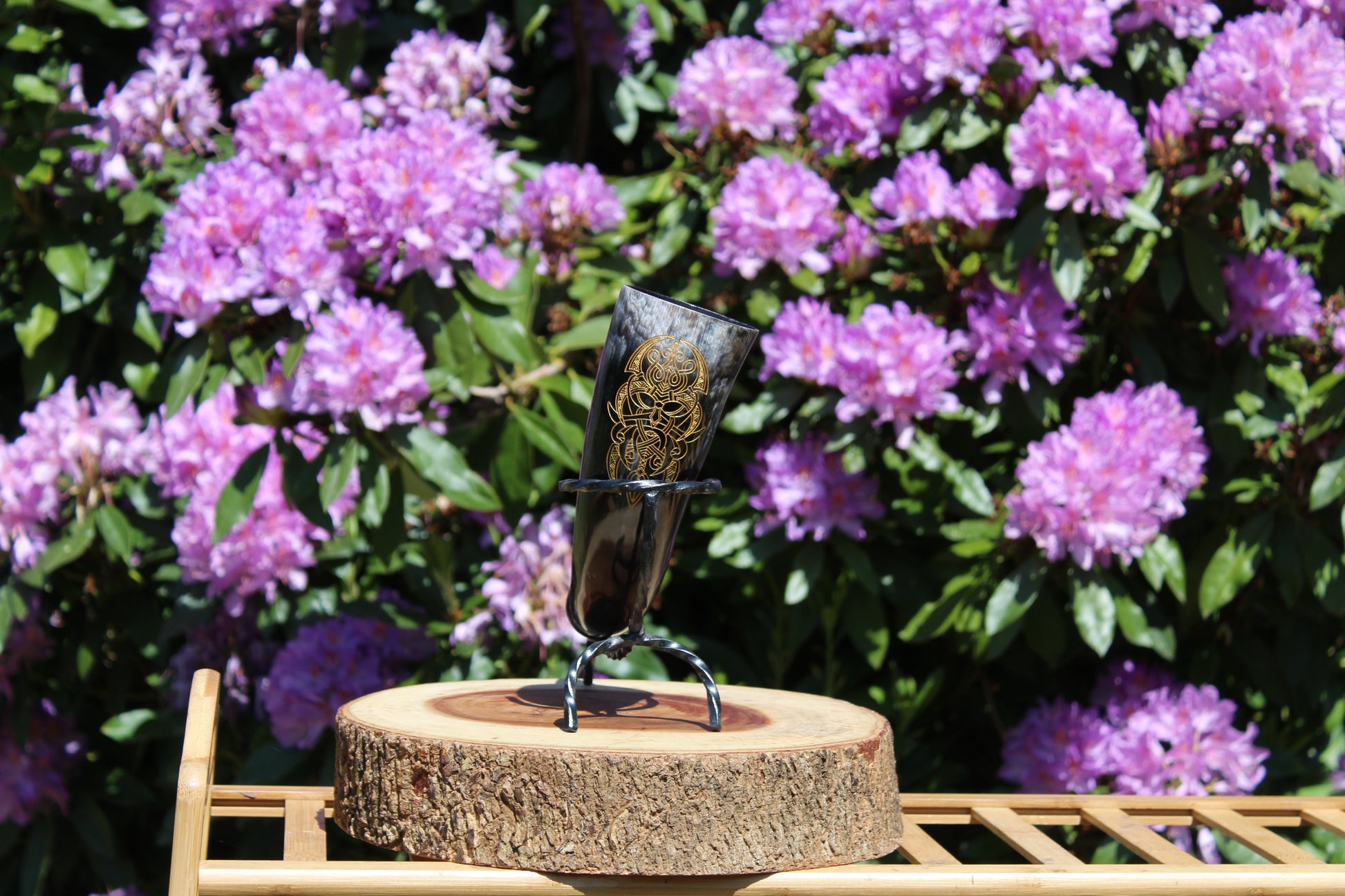 Drinking horns with handcrafted stand and unique design, polished natural horn for feasts and mead.