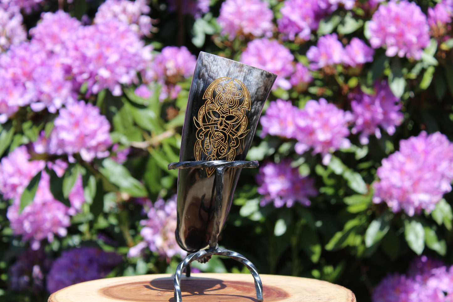 Drinking horns with handcrafted stand and unique design, polished natural horn for feasts and mead.