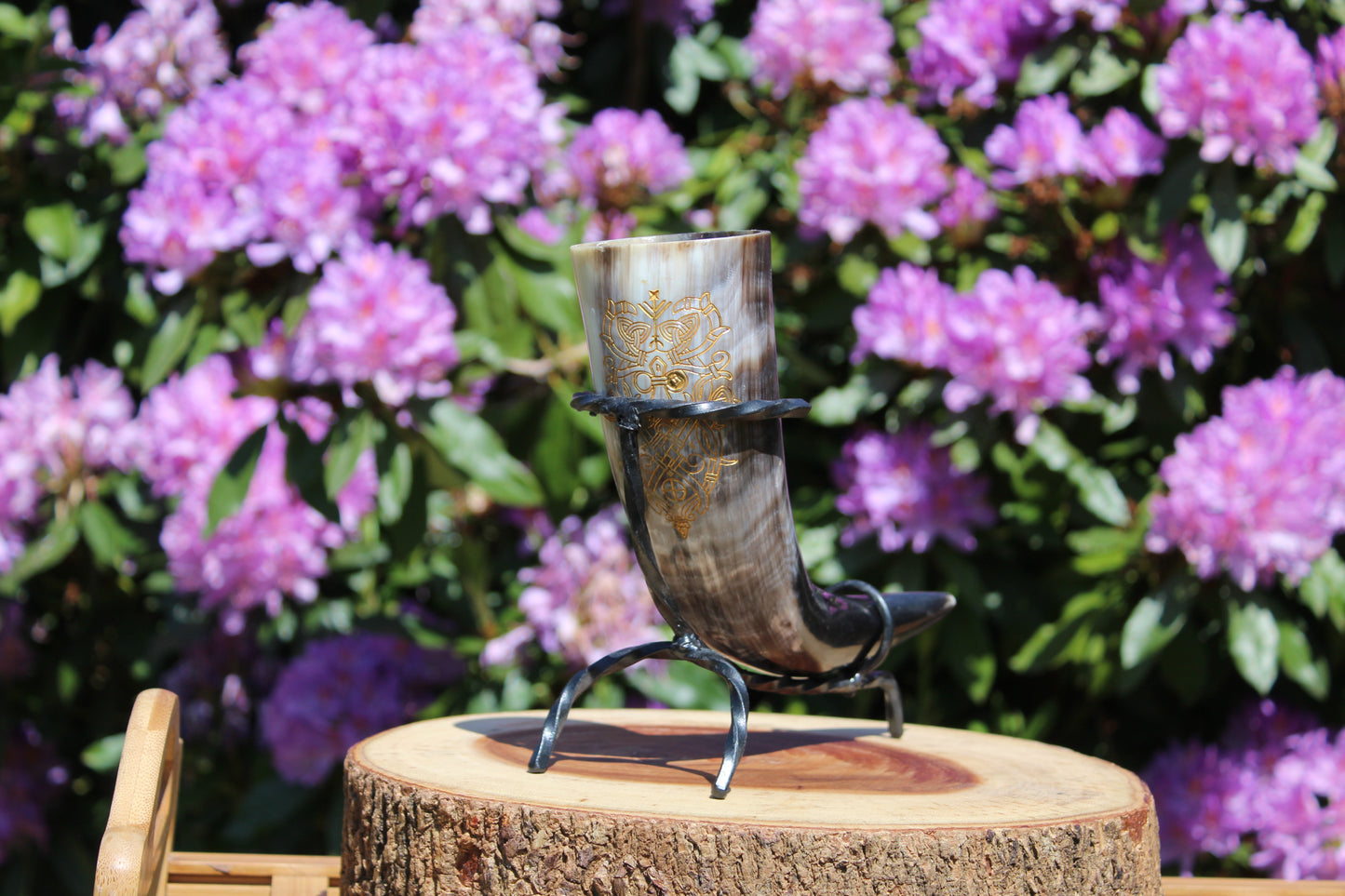 Drinking horns with handcrafted stand and unique design, polished natural horn for feasts and mead.