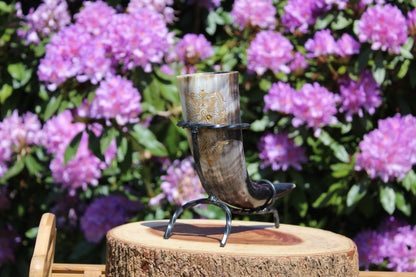 Drinking horns with handcrafted stand and unique design, polished natural horn for feasts and mead.