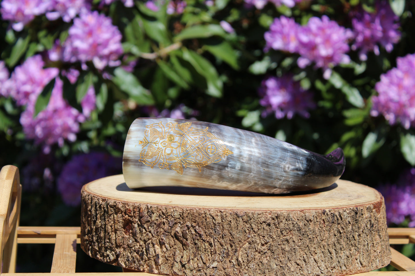 Drinking horns with handcrafted stand and unique design, polished natural horn for feasts and mead.