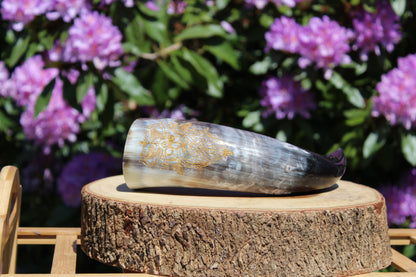 Drinking horns with handcrafted stand and unique design, polished natural horn for feasts and mead.