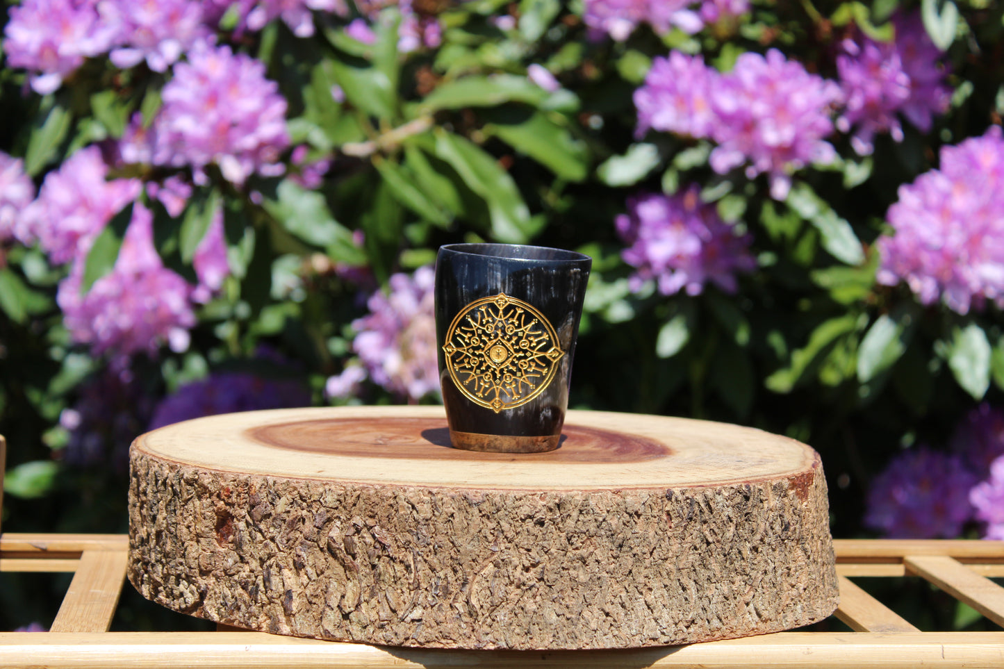 Handcrafted Viking horn shot glasses with natural polished finish, Norse drinkware for mead and whiskey.