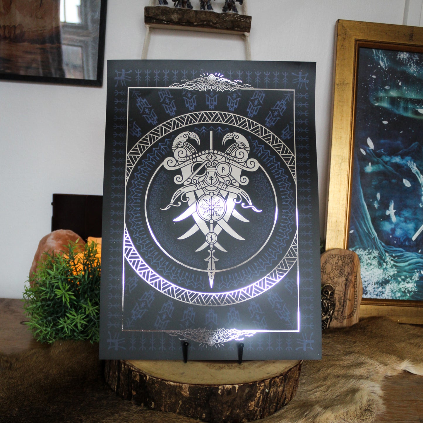 Silver foil A3 art print of Odin godmask inspired by Norse mythology and Viking art.