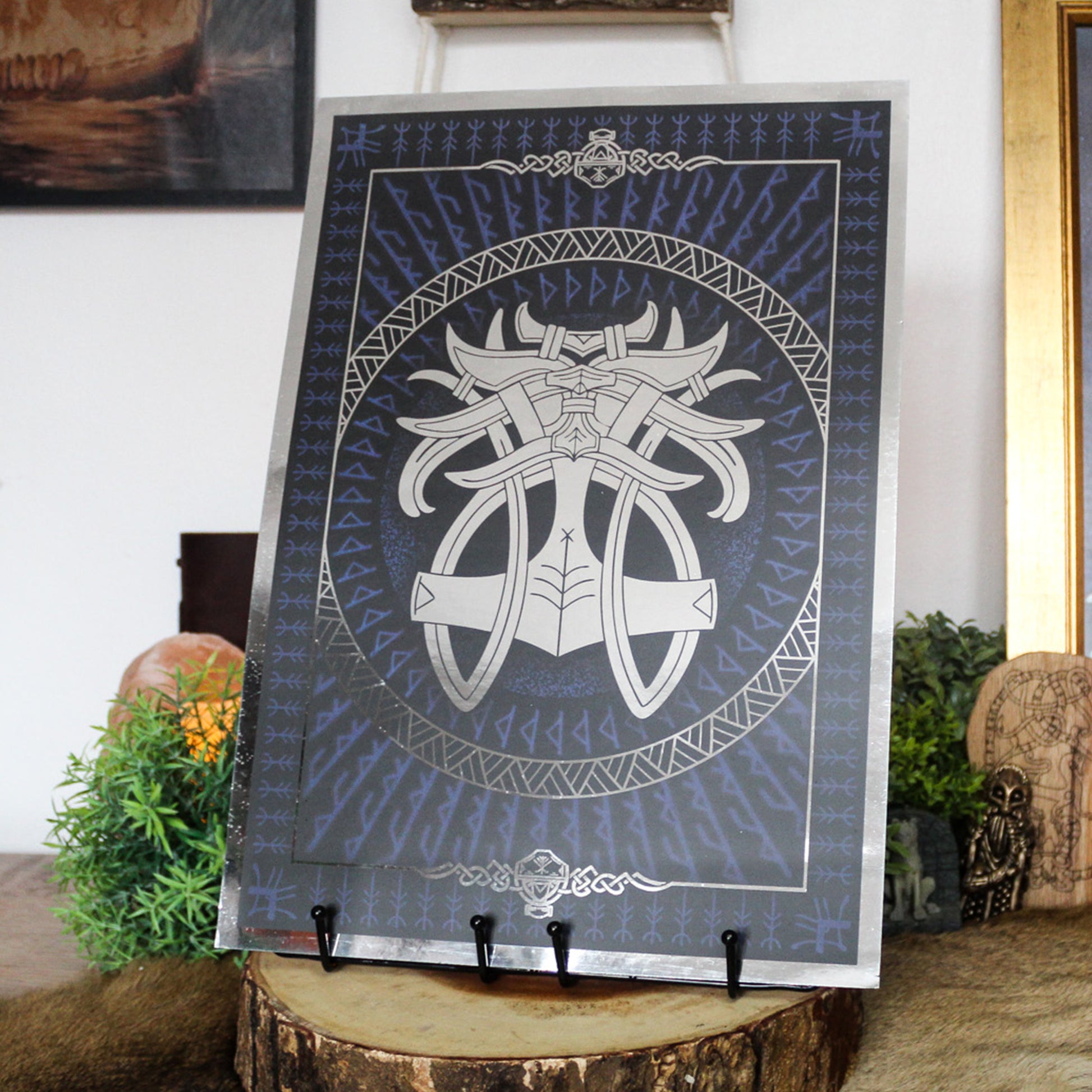 Silver foil A3 print godmask of Norse god Thor with Viking ornamentation and runic detail.