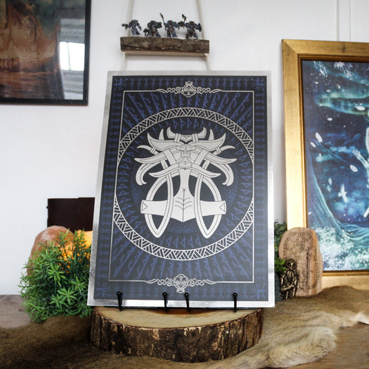 Silver foil A3 print godmask of Norse god Thor with Viking ornamentation and runic detail.