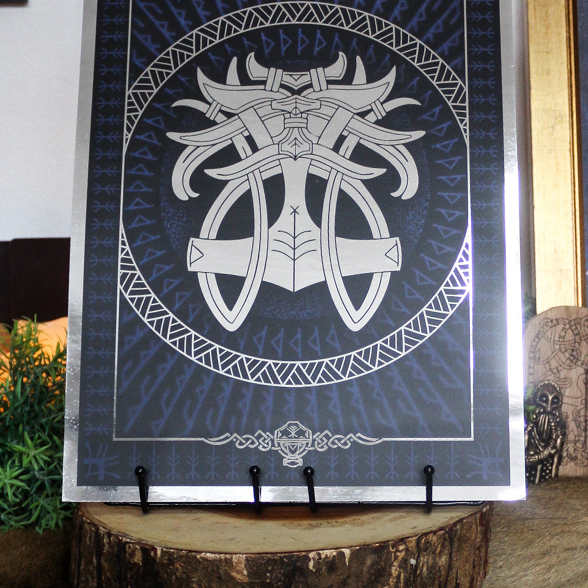 Silver foil A3 print godmask of Norse god Thor with Viking ornamentation and runic detail.