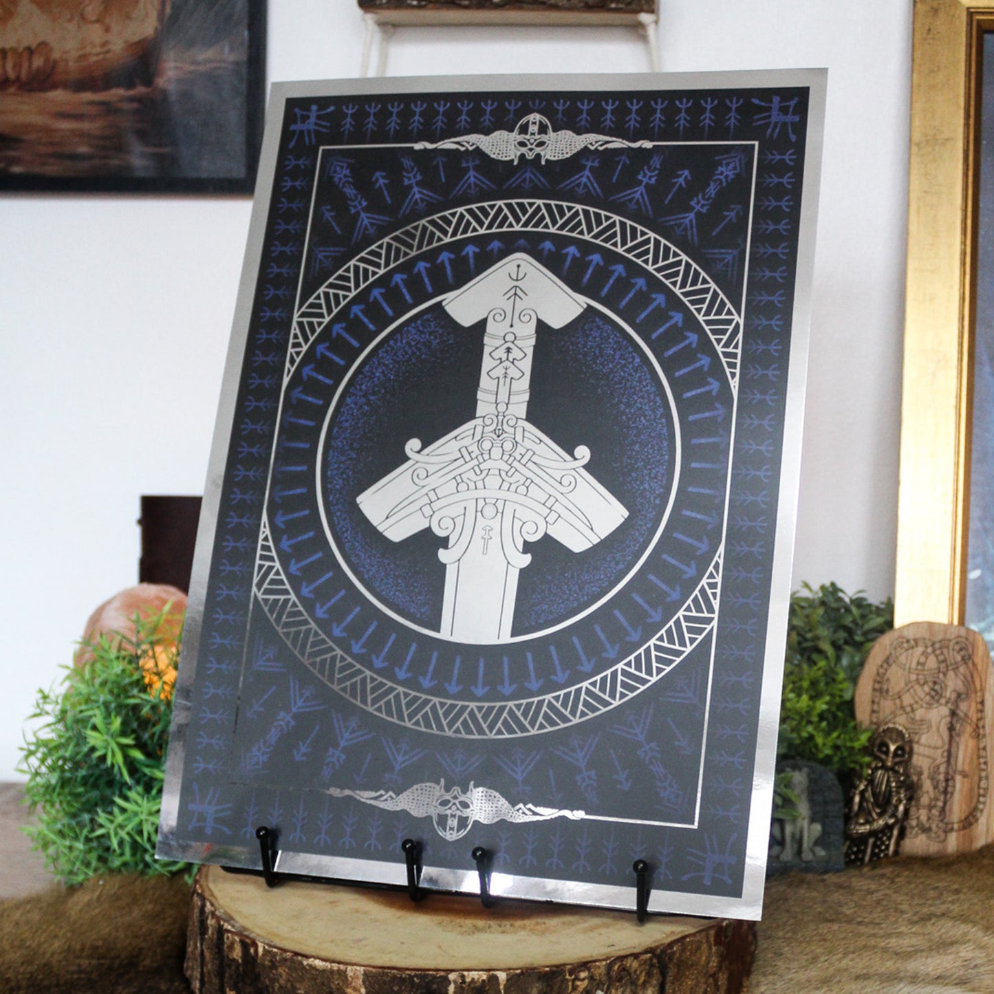 Silver foil A3 print of Norse god Tyr with Viking ornamentation and runic detail.