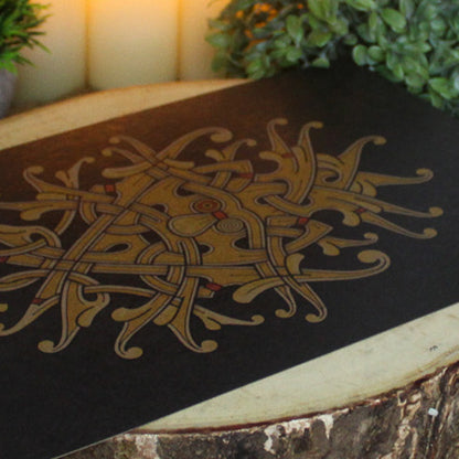 A4 print with intricate design, inspired by the ornate carvings and knotwork of the Viking age, represents the wisdom, sacrifice, and fierce intelligence of the chief of the Æsir. Created by Jonas Lau Markussen.