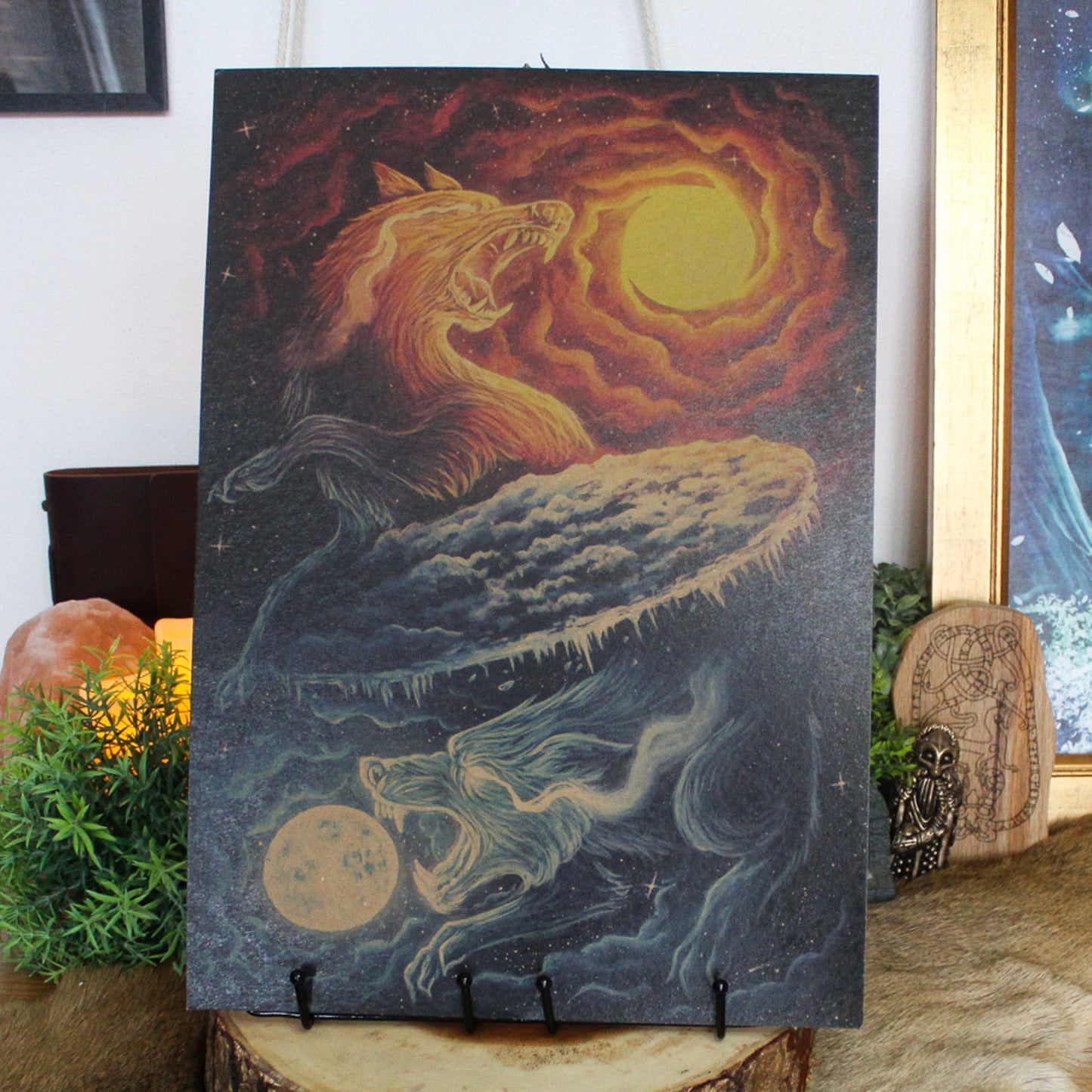 A3 art print of Sköll and Hati, the wolves who chase the sun and moon in Norse myth, printed on recycled brown paper for a rustic finish.