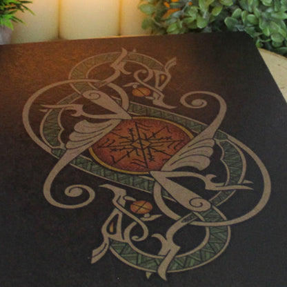 A4 print with a stunning depiction of the celestial wolves, Sköll and Hati, two great figures of Norse myth. This print captures their eternal pursuit in a striking, interwoven traditional Viking knotwork design. Created by Jonas Lau Markussen.