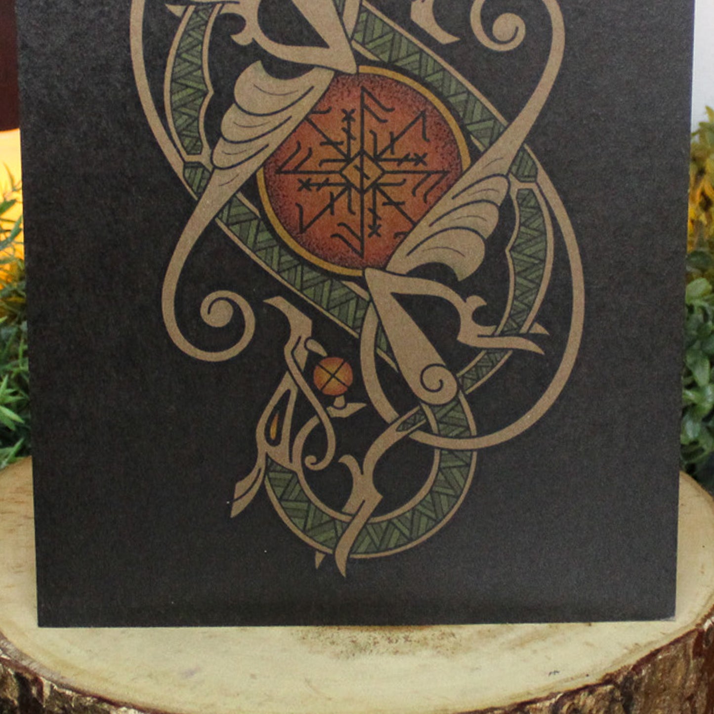 A4 print with a stunning depiction of the celestial wolves, Sköll and Hati, two great figures of Norse myth. This print captures their eternal pursuit in a striking, interwoven traditional Viking knotwork design. Created by Jonas Lau Markussen.