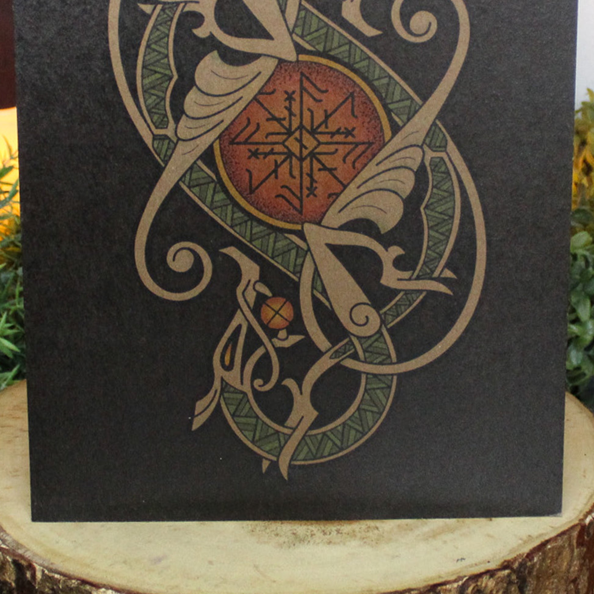 A4 print with a stunning depiction of the celestial wolves, Sköll and Hati, two great figures of Norse myth. This print captures their eternal pursuit in a striking, interwoven traditional Viking knotwork design. Created by Jonas Lau Markussen.