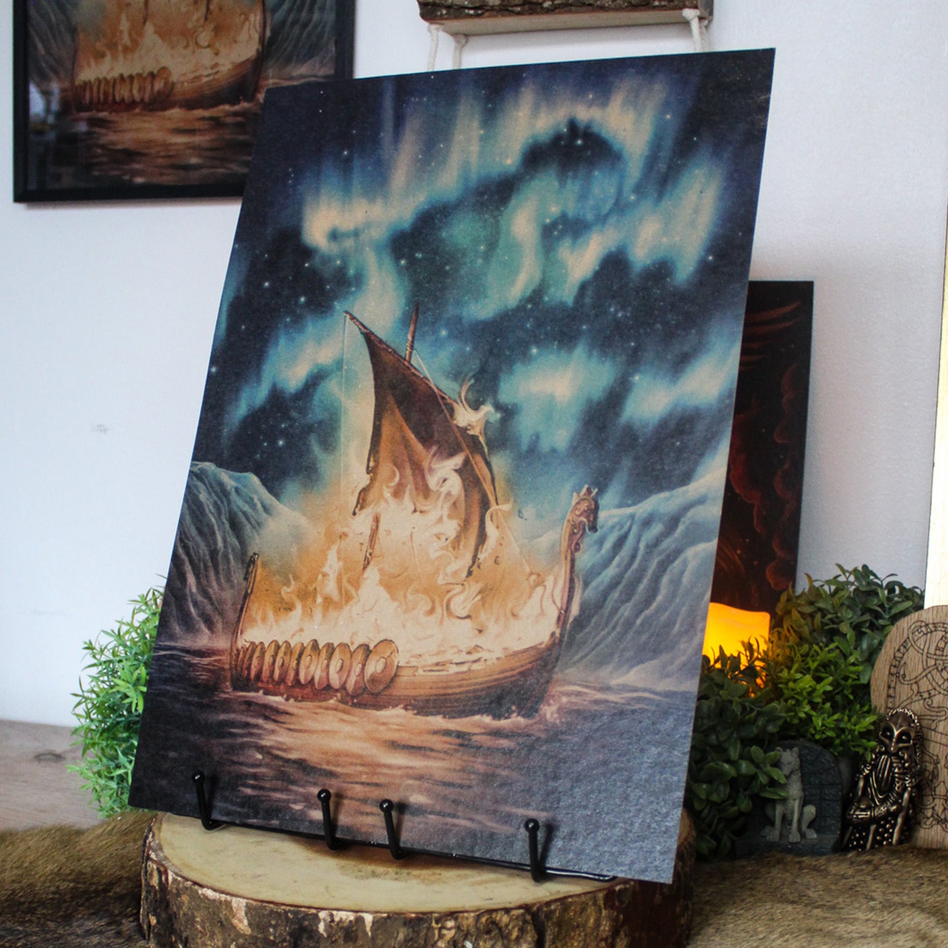 A3 art print of Viking funeral with burning ship on the water inspired by Norse myth, printed on recycled brown paper for a rustic finish.