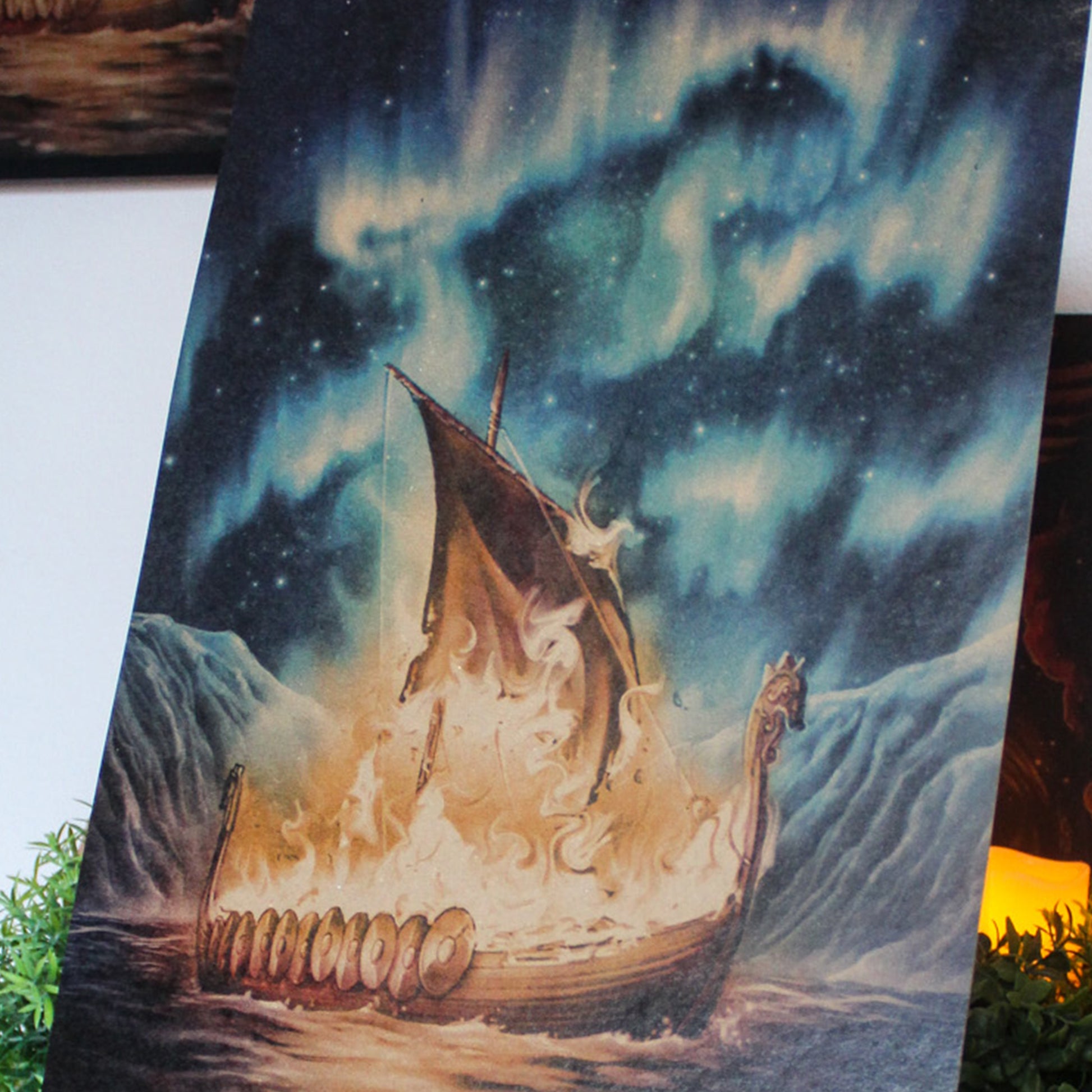 A3 art print of Viking funeral with burning ship on the water inspired by Norse myth, printed on recycled brown paper for a rustic finish.